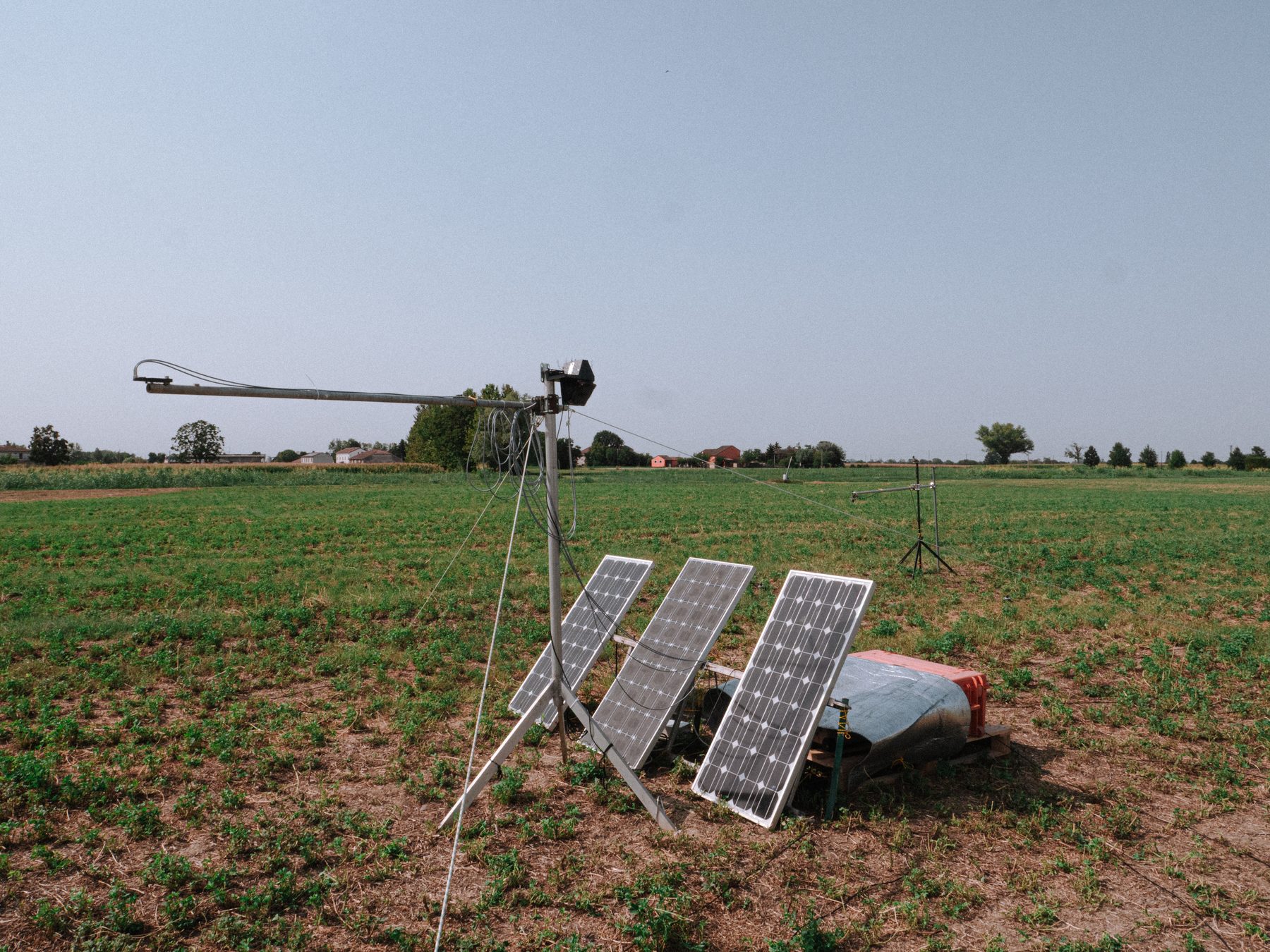 Solar-powered FloX automated fluorescence and reflectance system installed in an alfalfa reference field in Italy