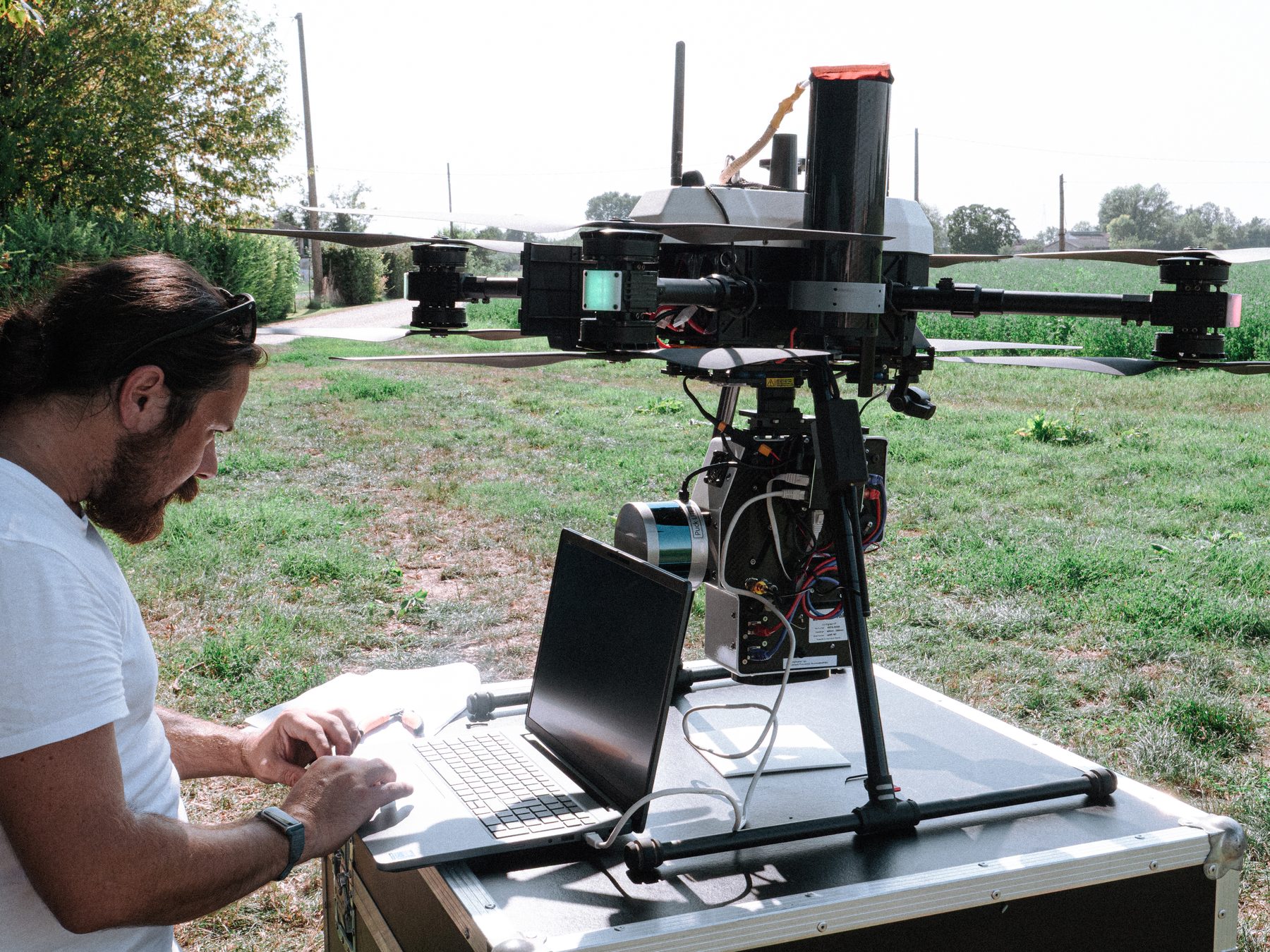 Compact hyperspectral nano sensor payload being prepared for a UAV flight during the Italy field campaign